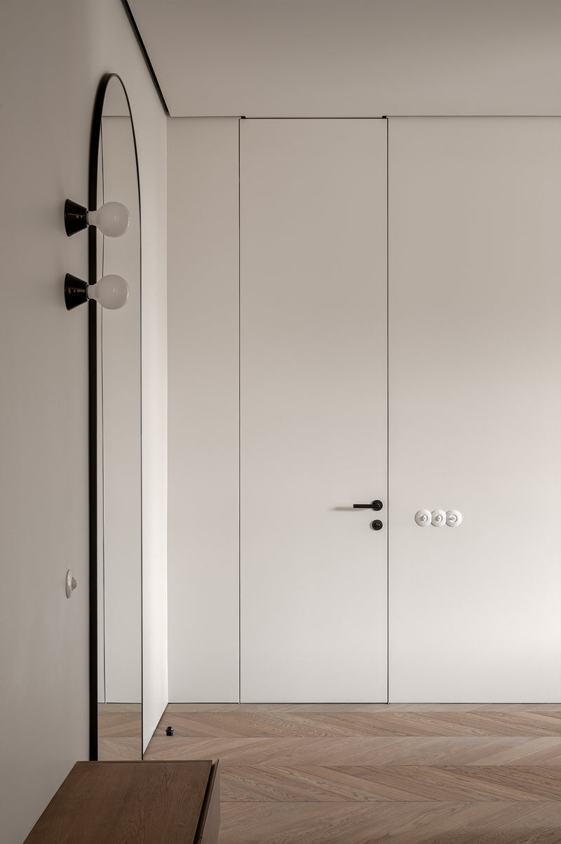 Modern interior with a closed door and minimal decor
