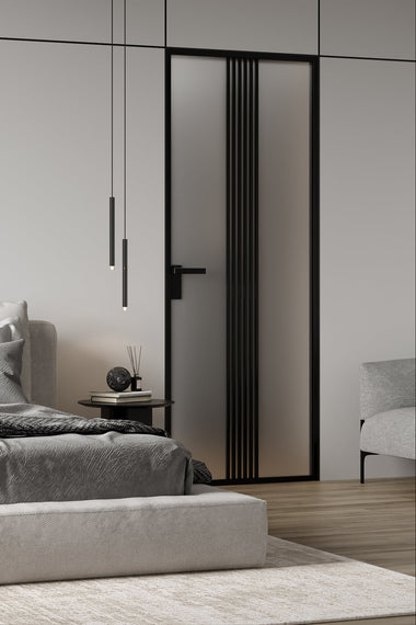 Modern bedroom with a bed, nightstand, and decorative items.